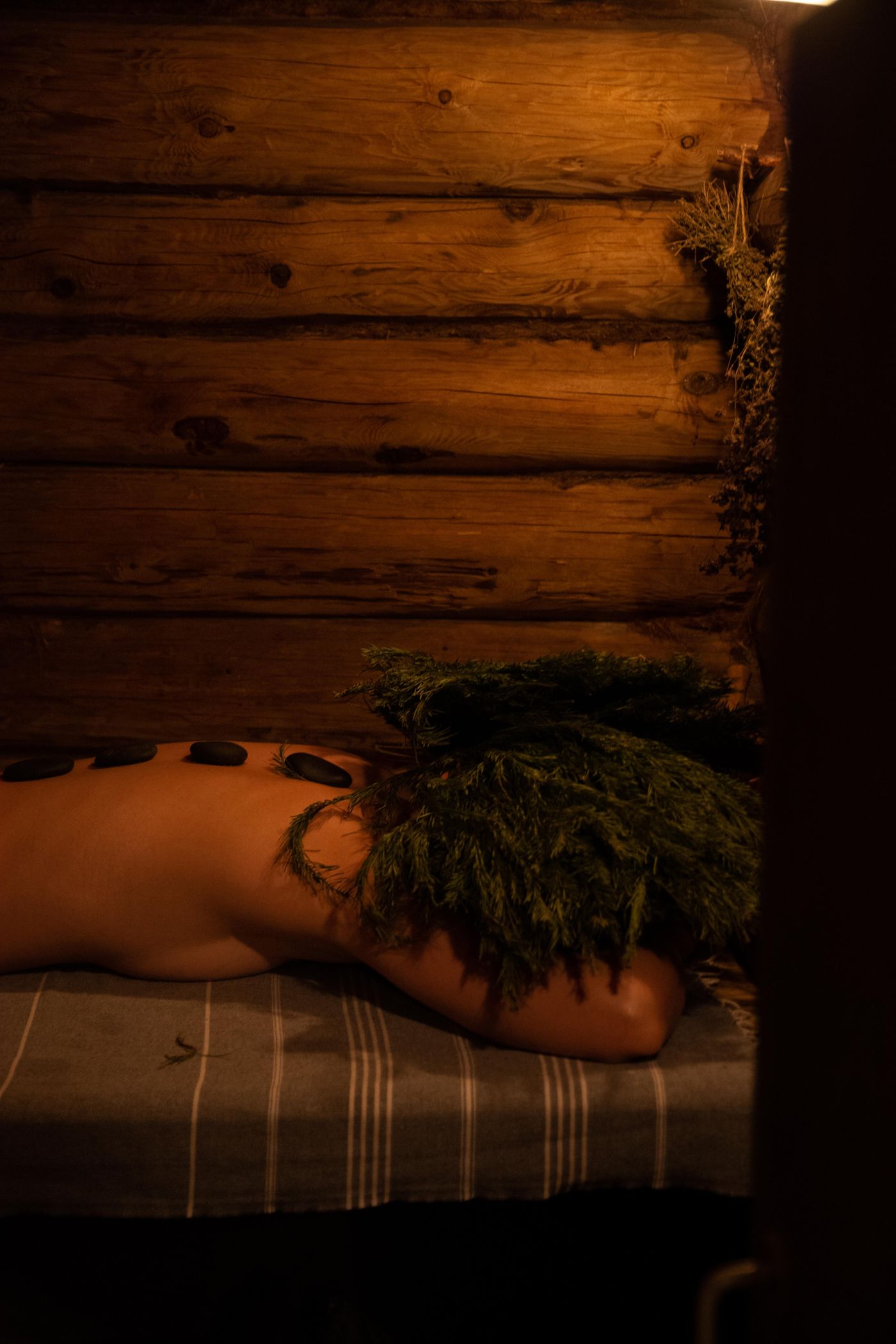 Professional hot-stone massage setting in a calm room